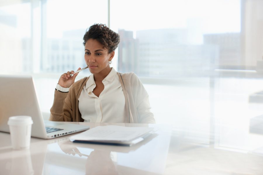 businesswoman-looking-at-laptop