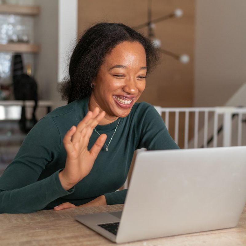 woman-waving-at-online-group