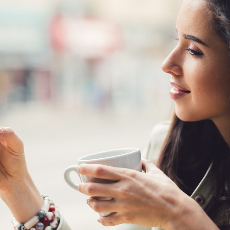 woman-using-smartphone-coffee-break