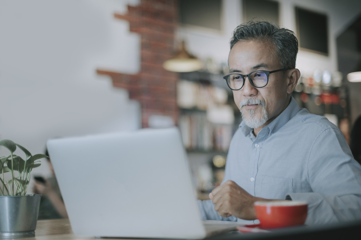 man-attending-online-meeting