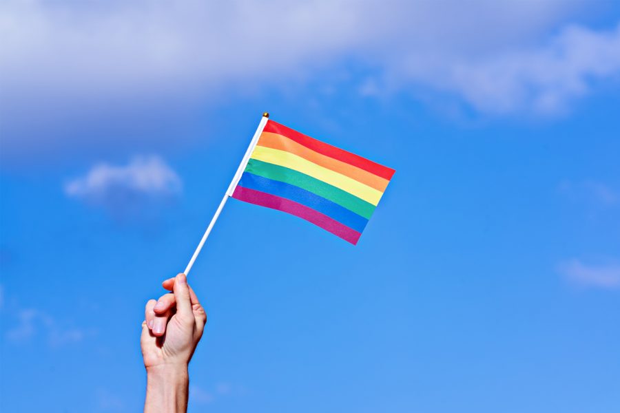 hand-LGBTQ-rainbow-flag
