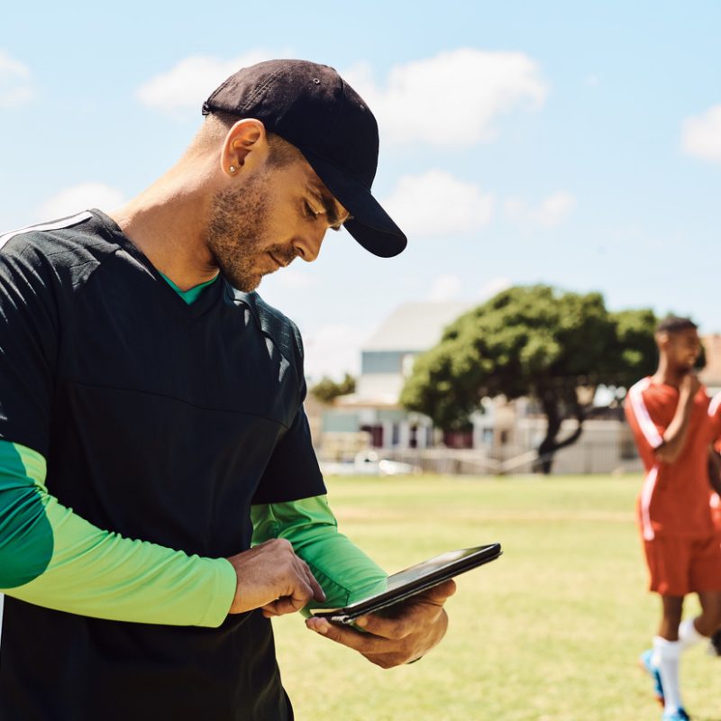soccer-coach-using-tablet